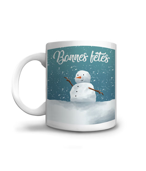 Le bonhome de neige vous souhaite de bonnes fêtes sur son mug à offrir en cadeau